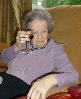 Celebrating her 90th with a glass of wine
